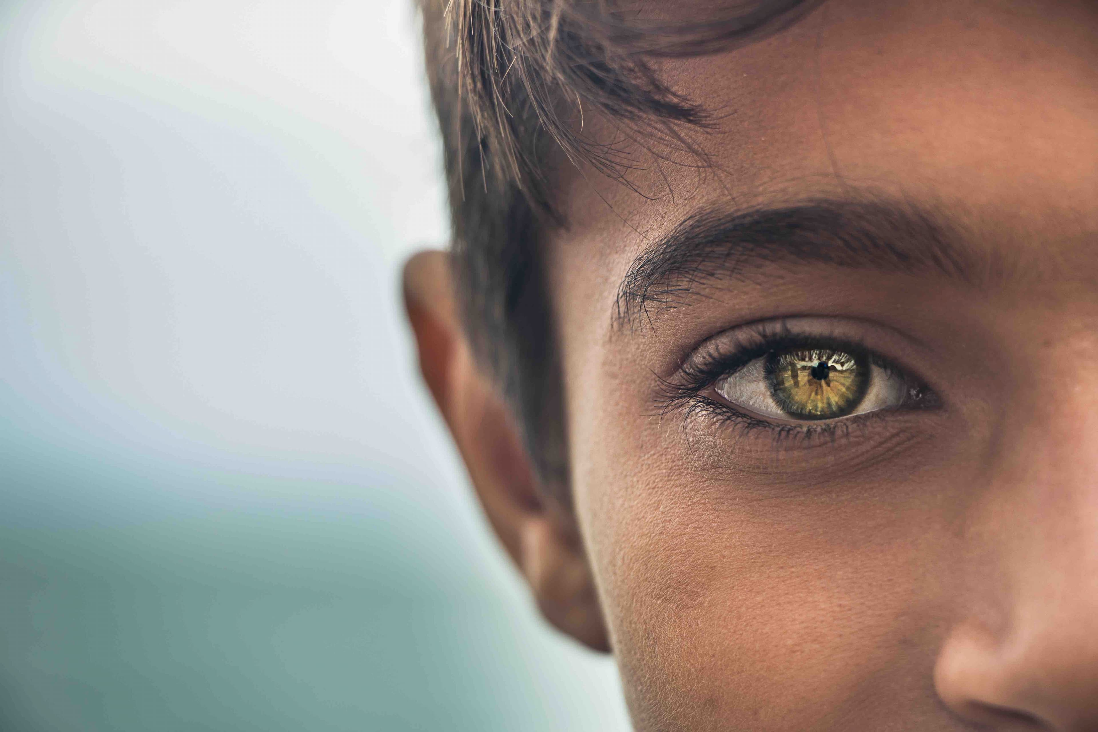 Young boy looking into the camera